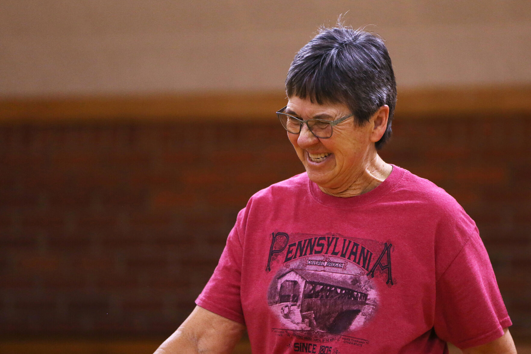 Brenda Foster laughs as she recovers a shanked ball